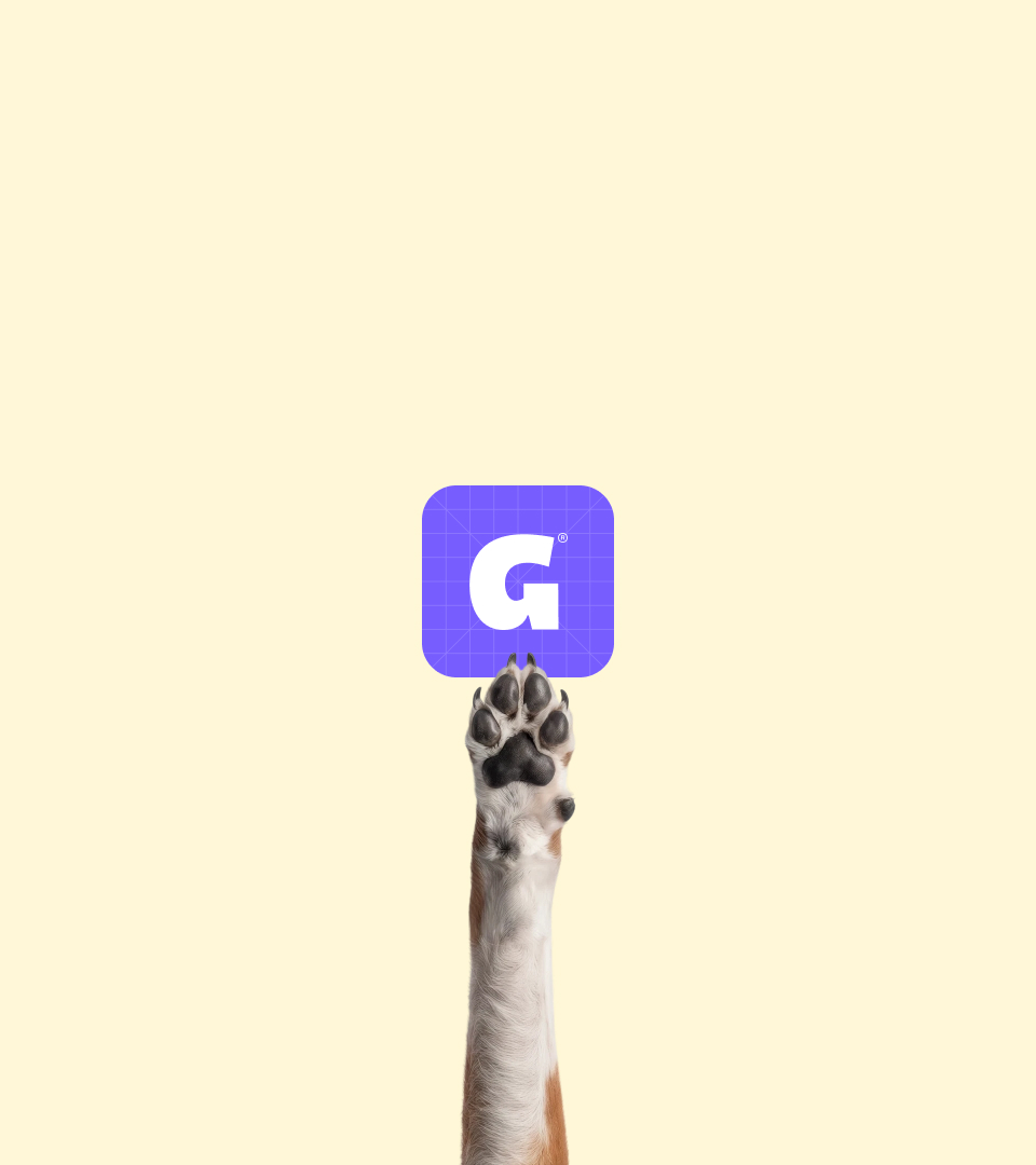 Pata de perro sosteniendo el ícono de la app Good Guys